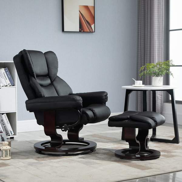 Black leather 2024 chair and footstool